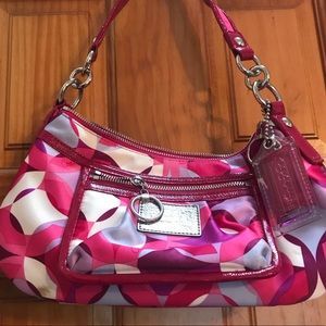 Coach mini shoulder bag with extra strap.